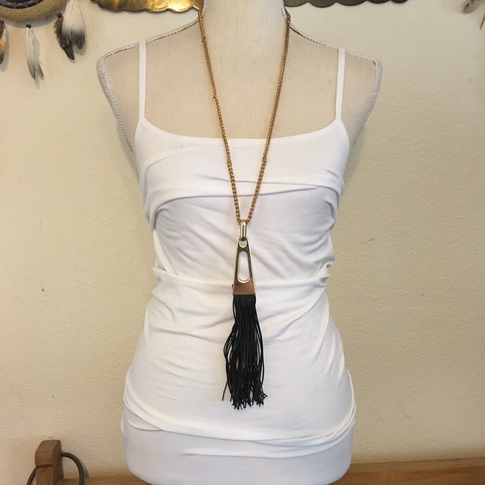 Chunky gold tone chain with tassel pendant